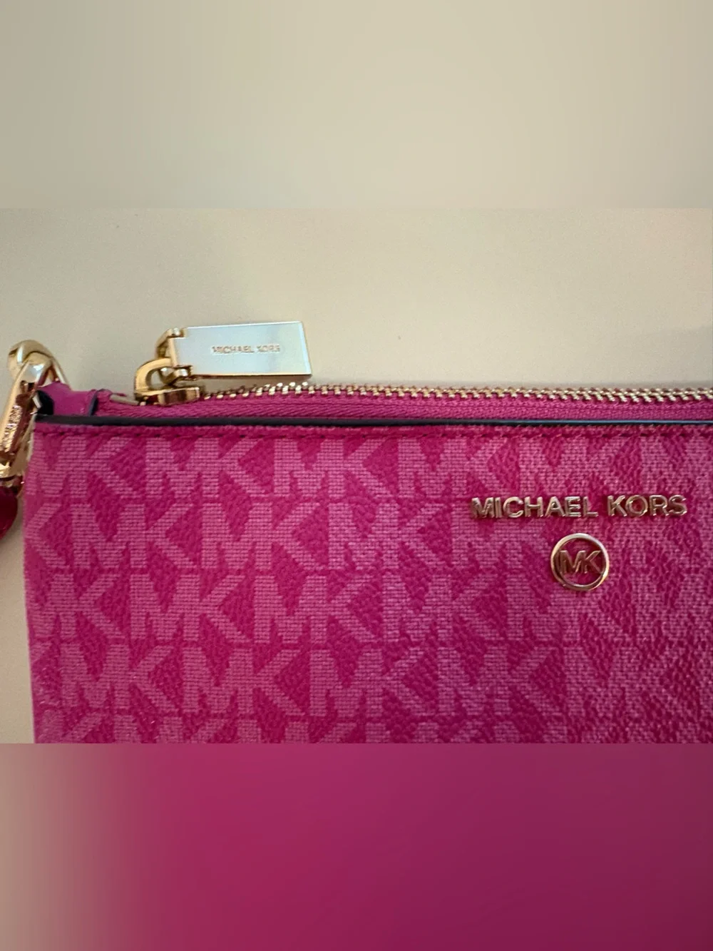Michael Kors phone branded tone
